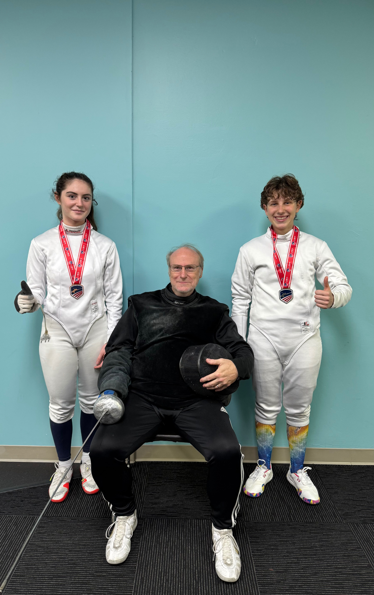 Proud Coach Michael with 2 Summer National Medalists