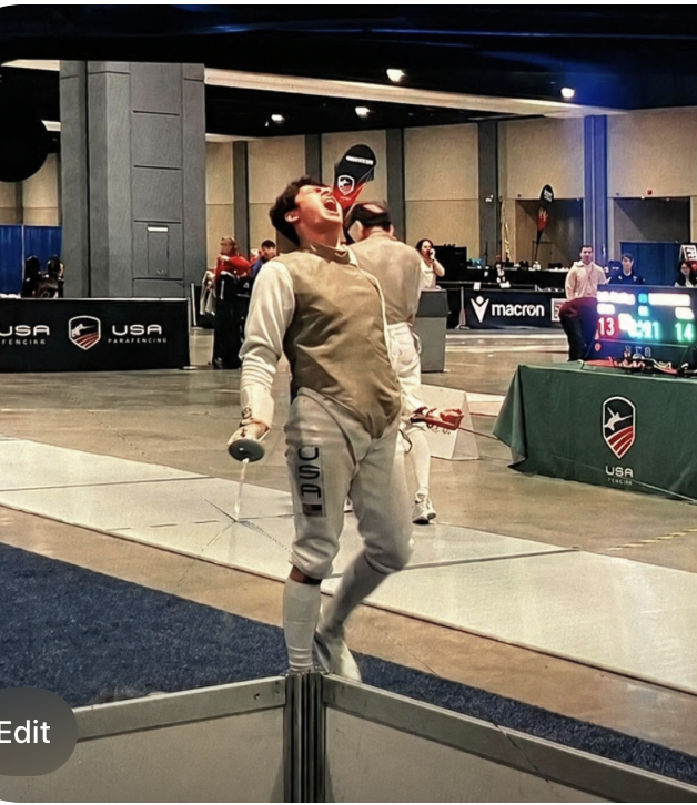 BAFC fencer celebrating a touch on the strip