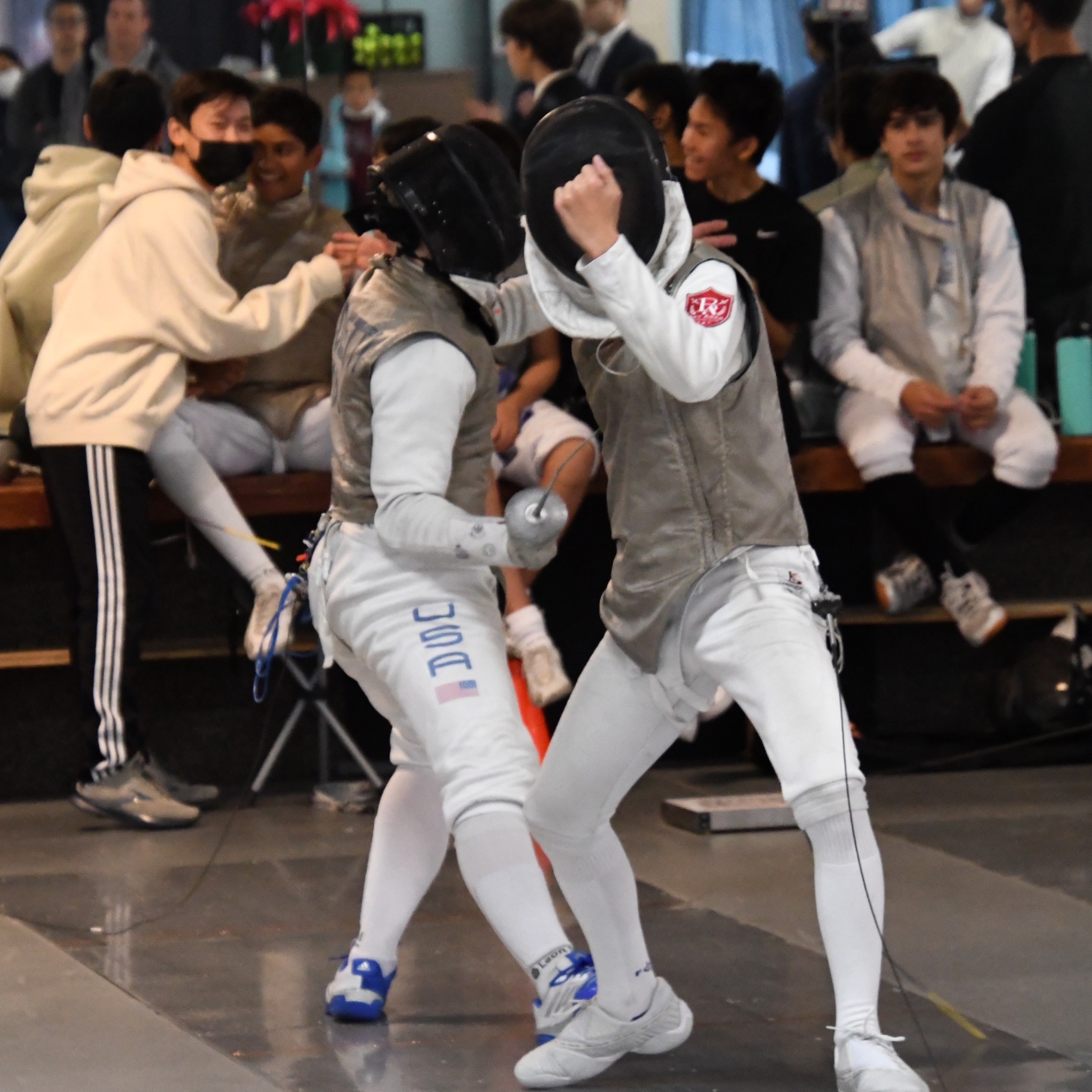 BAFC fencer Lucas scored a touch on the strip mid-bout