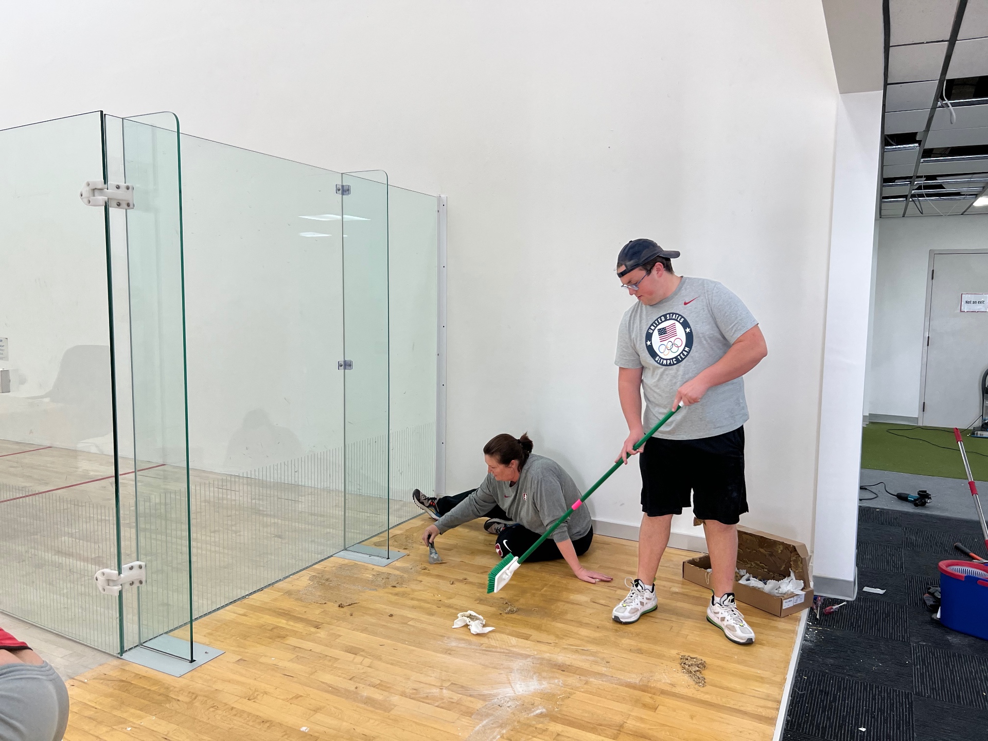 Club build-out — sweeping and prepping the court at BAFC